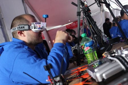 Price gears up for his sixth round of racing using his first-person view (FPV) goggles.